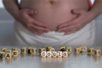 hiring a doula can make childbirth much easier, tips for new parents image